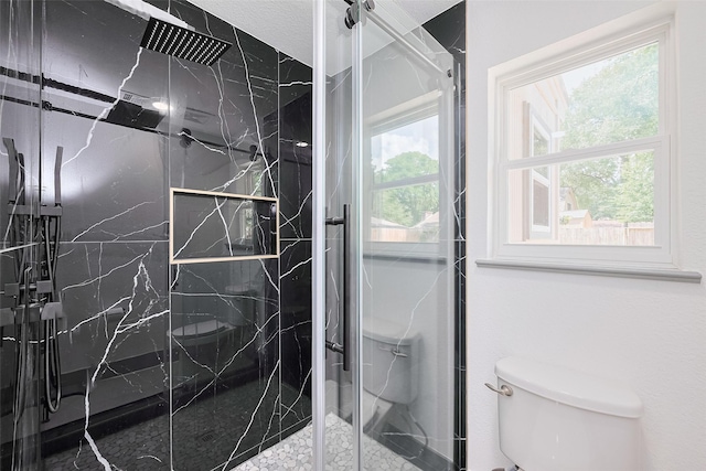 14823 Forest Lodge Dr, Houston, TX 77070 - full bath with a marble finish shower and toilet