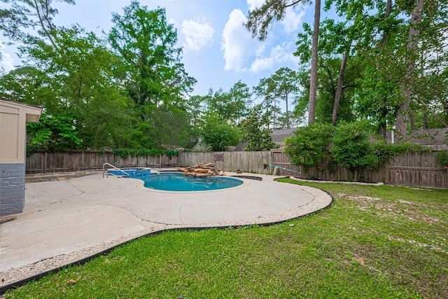 14823 Forest Lodge Dr, Houston, TX 77070 - view of swimming pool with a yard, a patio, a fenced in pool, and a fenced backyard