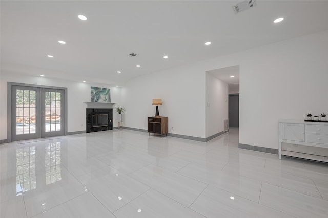 14823 Forest Lodge Dr, Houston, TX 77070 - unfurnished living room featuring light tile patterned floors, baseboards, recessed lighting, and visible vents
