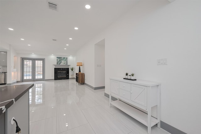 14823 Forest Lodge Dr, Houston, TX 77070 - hall with baseboards, recessed lighting, light tile patterned flooring, and visible vents