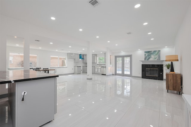 14823 Forest Lodge Dr, Houston, TX 77070 - interior space with light tile patterned floors, a premium fireplace, recessed lighting, and visible vents