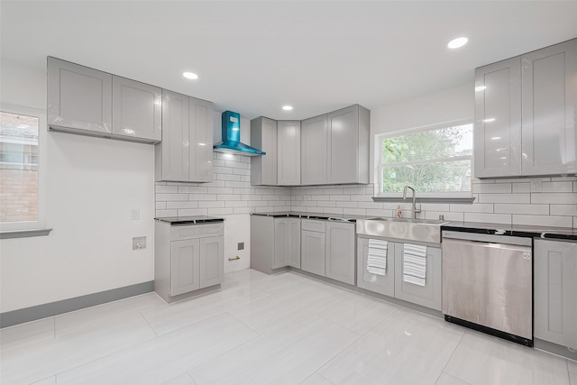 14823 Forest Lodge Dr, Houston, TX 77070 - kitchen with wall chimney range hood, decorative backsplash, gray cabinets, dishwasher, and a sink