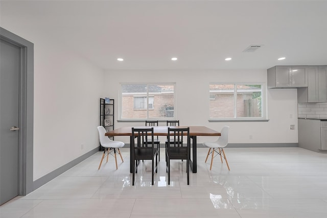 14823 Forest Lodge Dr, Houston, TX 77070 - dining room featuring recessed lighting, baseboards, and visible vents