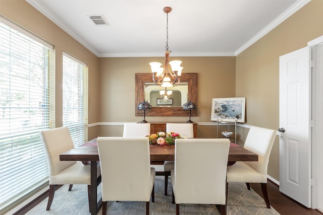 3902 Lakeridge Canyon Dr, Sugar Land, TX 77498 - dining room with a chandelier, crown molding, and wood finished floors