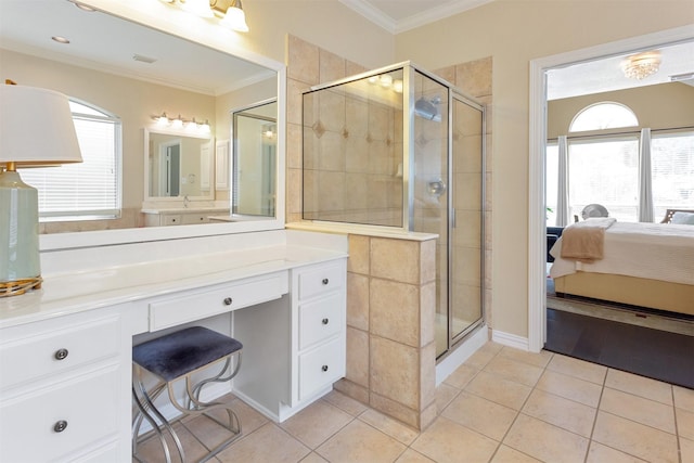3902 Lakeridge Canyon Dr, Sugar Land, TX 77498 - ensuite bathroom with ornamental molding, tile patterned floors, a shower stall, and vanity