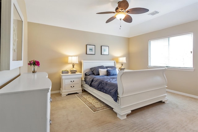 3902 Lakeridge Canyon Dr, Sugar Land, TX 77498 - bedroom with light carpet, baseboards, and a ceiling fan