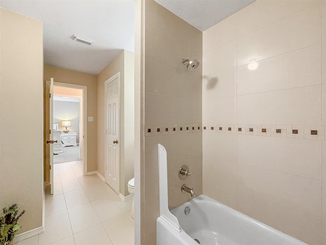 3902 Lakeridge Canyon Dr, Sugar Land, TX 77498 - full bathroom featuring toilet, tile patterned flooring, shower / bathtub combination, and baseboards