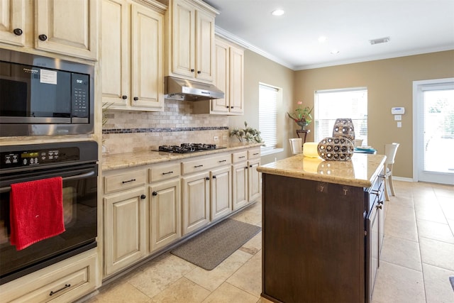 3902 Lakeridge Canyon Dr, Sugar Land, TX 77498 - kitchen with oven, under cabinet range hood, built in microwave, ornamental molding, and decorative backsplash