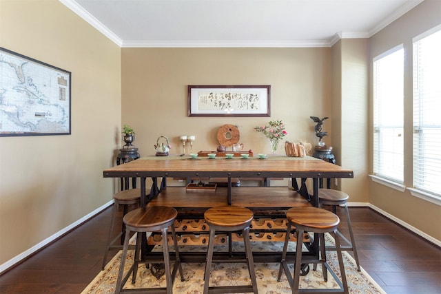 3902 Lakeridge Canyon Dr, Sugar Land, TX 77498 - dining area with ornamental molding, baseboards, and dark wood-style floors