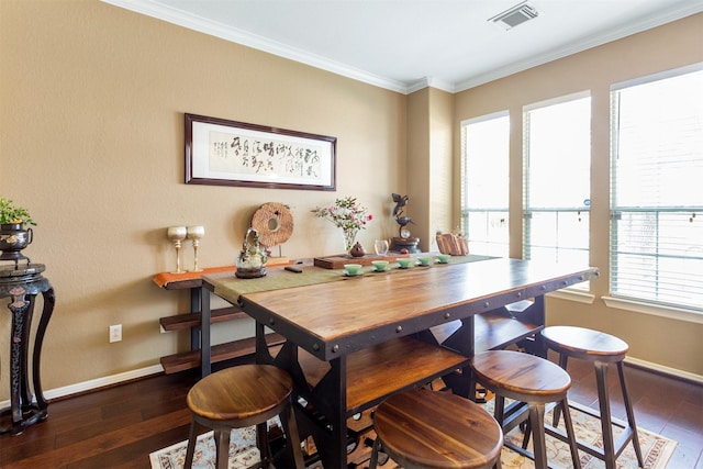 3902 Lakeridge Canyon Dr, Sugar Land, TX 77498 - dining space with baseboards, hardwood / wood-style flooring, and ornamental molding
