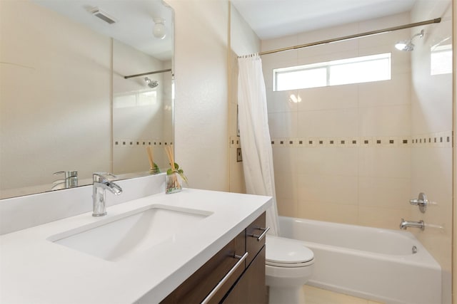 3902 Lakeridge Canyon Dr, Sugar Land, TX 77498 - bathroom featuring shower / bath combo with shower curtain, toilet, and vanity