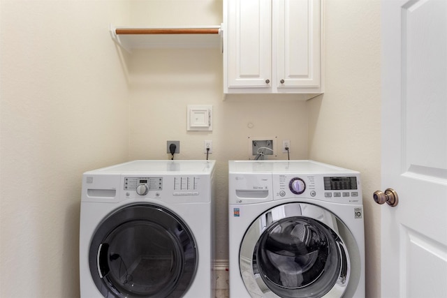 3902 Lakeridge Canyon Dr, Sugar Land, TX 77498 - laundry area with cabinet space and separate washer and dryer