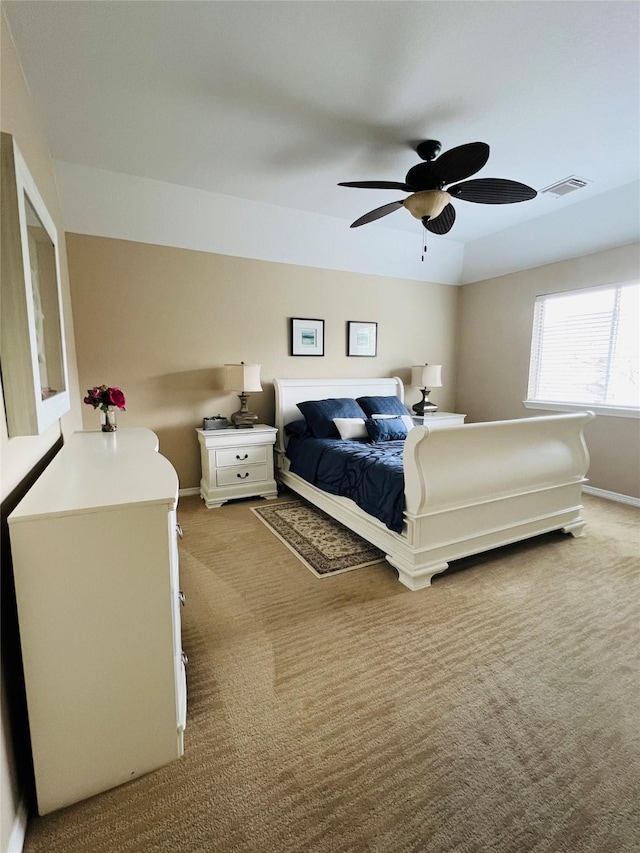 3902 Lakeridge Canyon Dr, Sugar Land, TX 77498 - bedroom with light carpet, baseboards, and ceiling fan