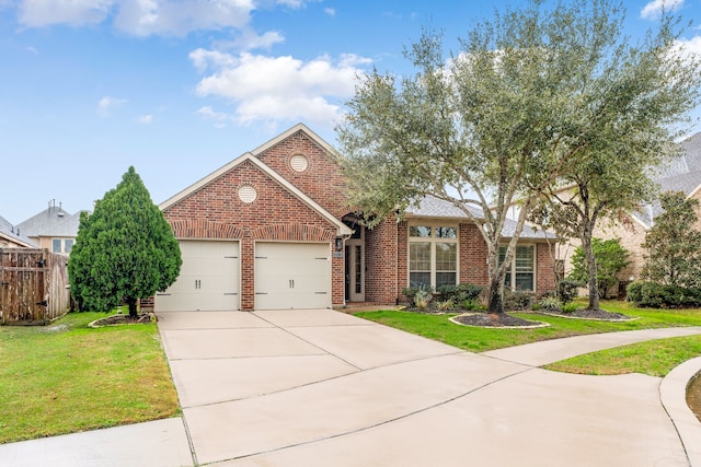view of front of home featuring brick siding, a front yard, concrete driveway, and an attached garage