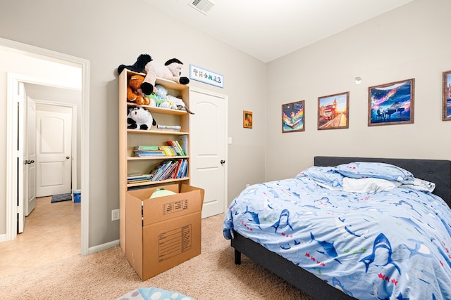 bedroom featuring carpet, visible vents, and baseboards
