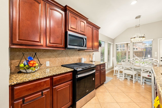 kitchen featuring light stone counters, decorative backsplash, light tile patterned floors, appliances with stainless steel finishes, and lofted ceiling