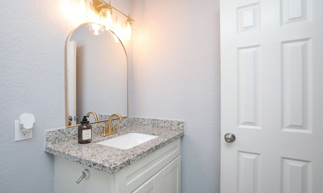 4538 Clover St, Houston, TX 77051 - bathroom featuring a textured wall and vanity