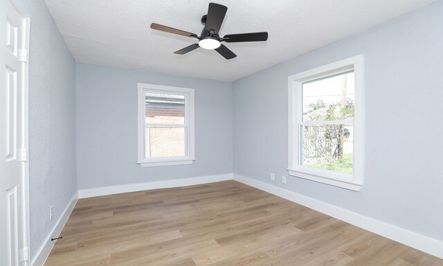 4538 Clover St, Houston, TX 77051 - spare room with baseboards, a ceiling fan, and light wood-type flooring