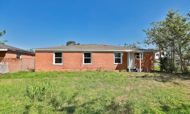 4538 Clover St, Houston, TX 77051 - back of house featuring fence, brick siding, and a yard
