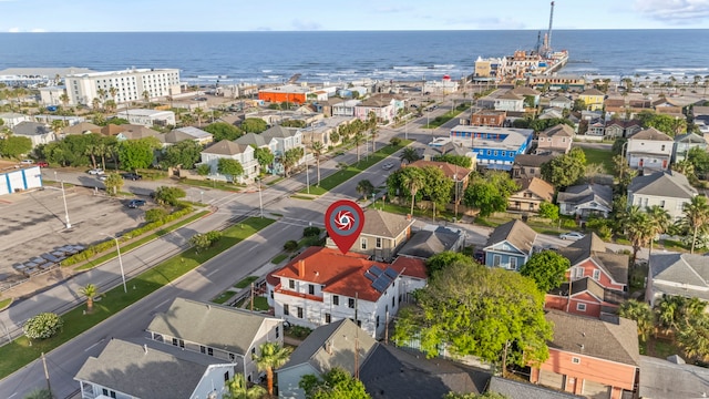birds eye view of property featuring a water view and a residential view