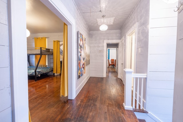 hallway with dark wood-type flooring