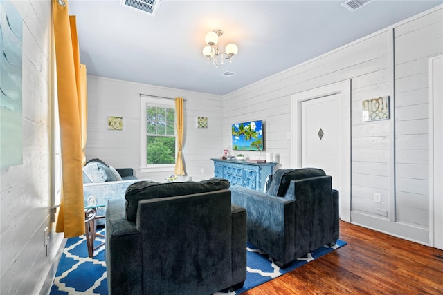 1919 Rosenberg St, Galveston, TX 77550 - living area with wood finished floors, a chandelier, and wooden walls