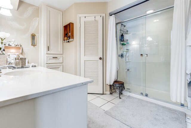 bathroom featuring vanity and a stall shower