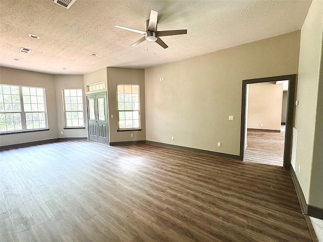 250 Bucek Ln, Schulenburg, TX 78956 - unfurnished room featuring wood finished floors, baseboards, and ceiling fan