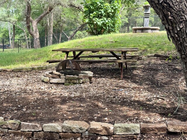 250 Bucek Ln, Schulenburg, TX 78956 - surrounding community with a fire pit and fence