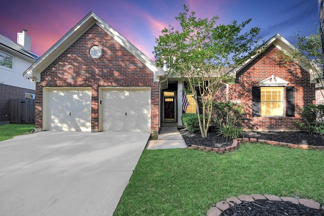 14019 Ivy Bluff Ct, Houston, TX 77062 - view of front of home featuring brick siding, driveway, a front lawn, and a garage