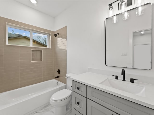 bathroom featuring bathtub / shower combination, marble finish floor, vanity, and toilet