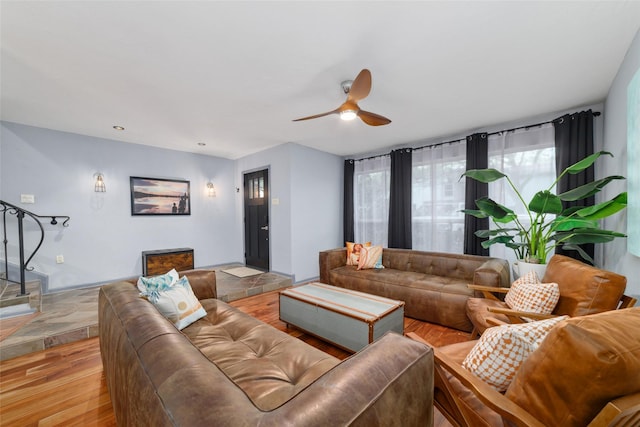 8924 Chatsworth Dr, Houston, TX 77024 - living area featuring light wood finished floors and ceiling fan
