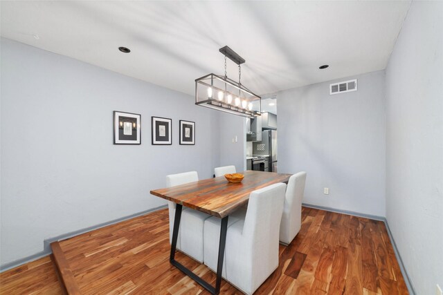 8924 Chatsworth Dr, Houston, TX 77024 - dining area with wood finished floors and baseboards