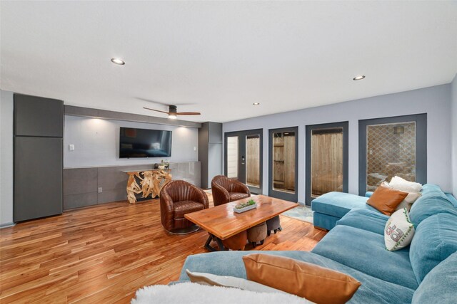 8924 Chatsworth Dr, Houston, TX 77024 - living area featuring light wood-type flooring, ceiling fan, and recessed lighting