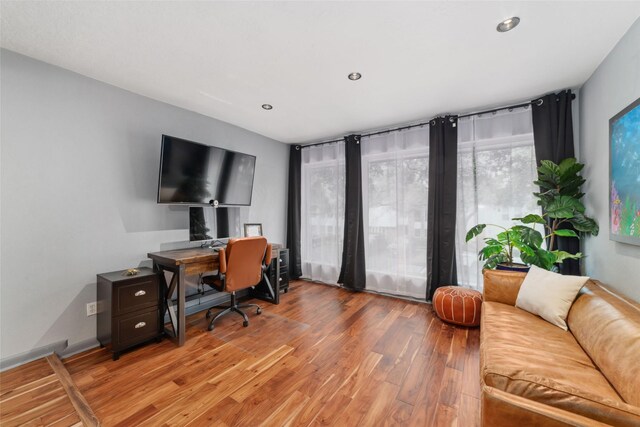 8924 Chatsworth Dr, Houston, TX 77024 - home office featuring light wood-style flooring and recessed lighting