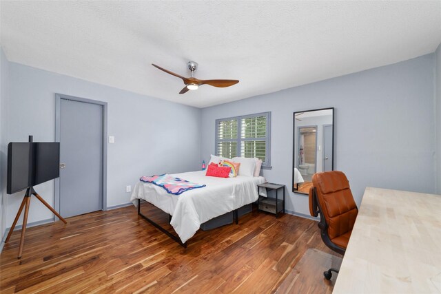8924 Chatsworth Dr, Houston, TX 77024 - bedroom with wood finished floors and a ceiling fan