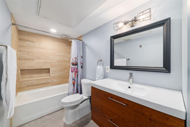 8924 Chatsworth Dr, Houston, TX 77024 - bathroom featuring vanity, toilet, tile patterned floors, and shower / bath combo