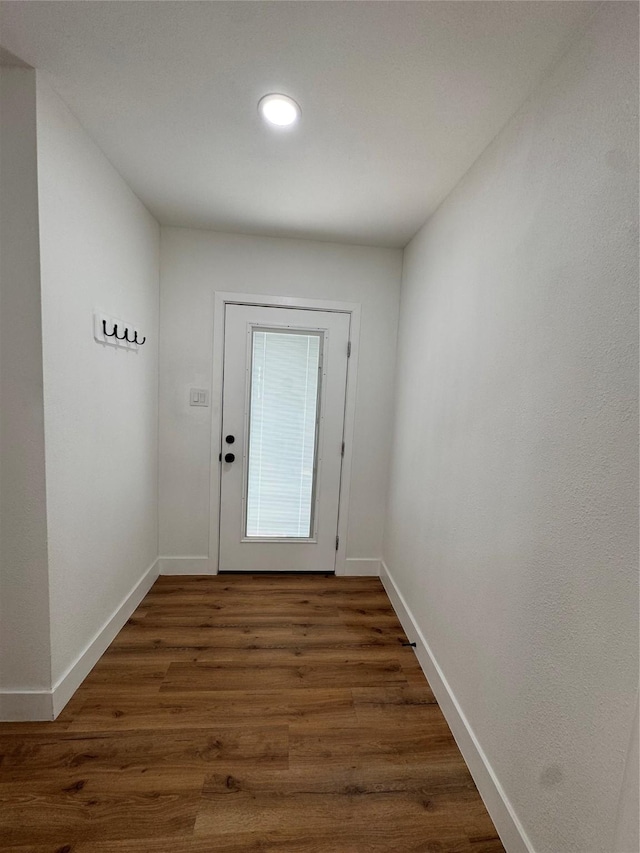 4414 Orange St, Houston, TX 77020 - doorway to outside with recessed lighting, baseboards, and dark wood finished floors