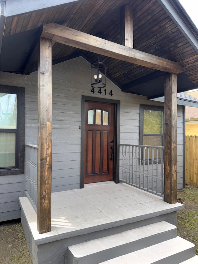 4414 Orange St, Houston, TX 77020 - property entrance featuring a porch and fence
