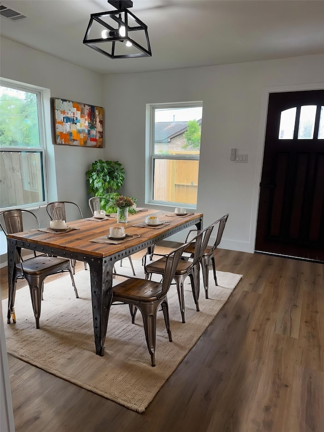 4414 Orange St, Houston, TX 77020 - dining space with visible vents, plenty of natural light, and wood finished floors