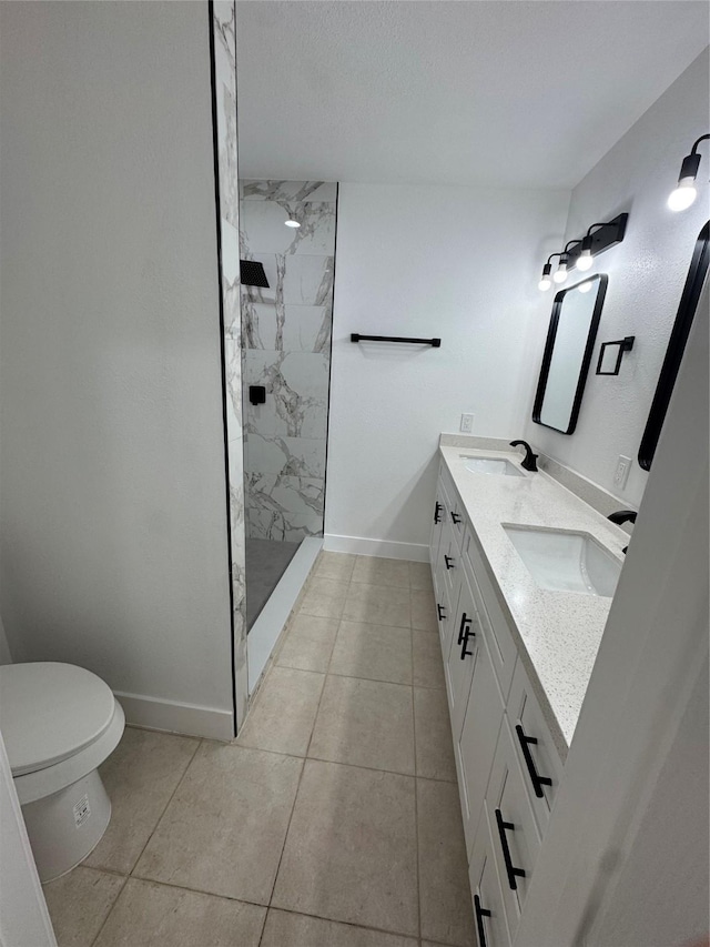 4414 Orange St, Houston, TX 77020 - full bathroom featuring a sink, baseboards, toilet, and tiled shower