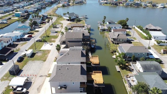 aerial view featuring a water view and a residential view