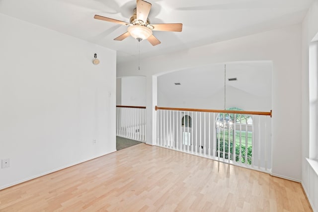 8010 Fox St, Baytown, TX 77523 - empty room featuring a ceiling fan and wood finished floors
