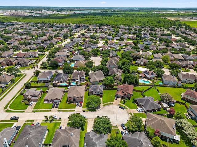 8010 Fox St, Baytown, TX 77523 - drone / aerial view featuring a residential view