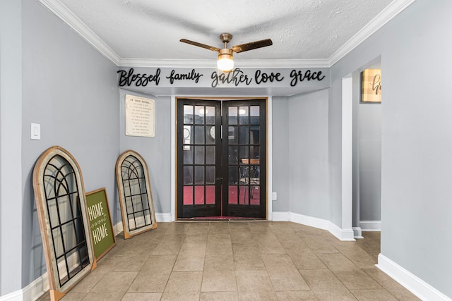 entryway with ceiling fan, crown molding, french doors, and a textured ceiling