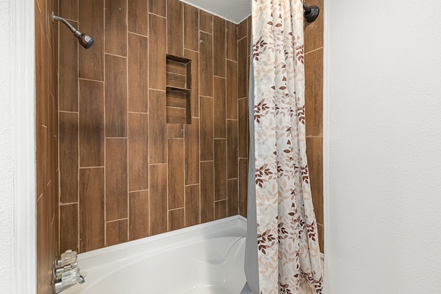 full bathroom featuring shower / bathtub combination with curtain
