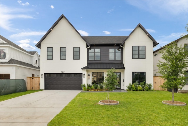 modern inspired farmhouse featuring concrete driveway, fence, a garage, stucco siding, and a standing seam roof