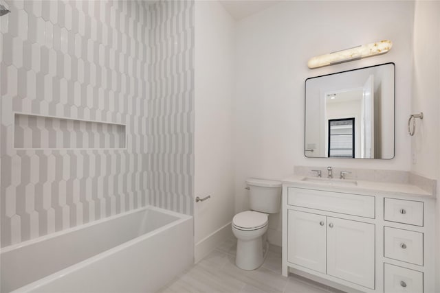 full bathroom featuring vanity, baseboards, toilet, tile patterned flooring, and bathing tub / shower combination