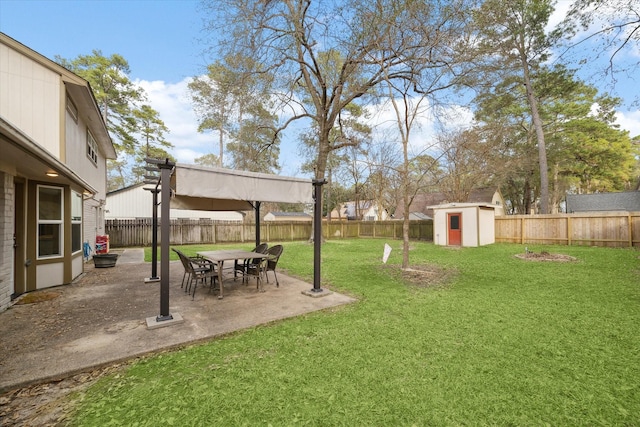 view of yard with a fenced backyard, an outdoor structure, a patio area, and a storage shed