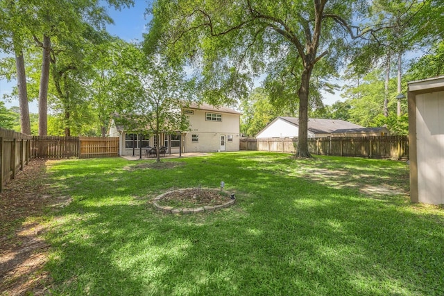 view of yard featuring a fenced backyard and a patio